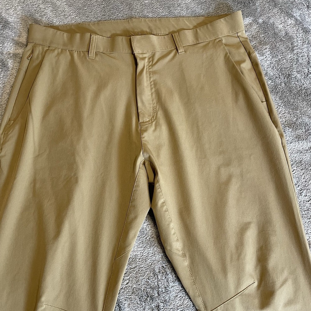 Fabletics Men's Size 34x29 The Only Pants Brown Stretch Performance Golf Casual - Picture 2 of 8